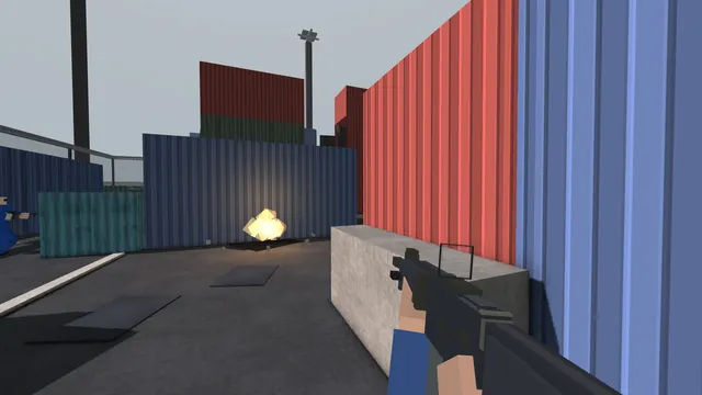 A grenade explodes in the middle of a Shipment lane between blue and red containers. No HUD